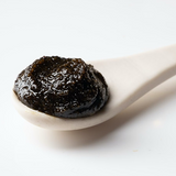 Josh Rosebrook Active Enzyme Exfoliator close up texture on spoon