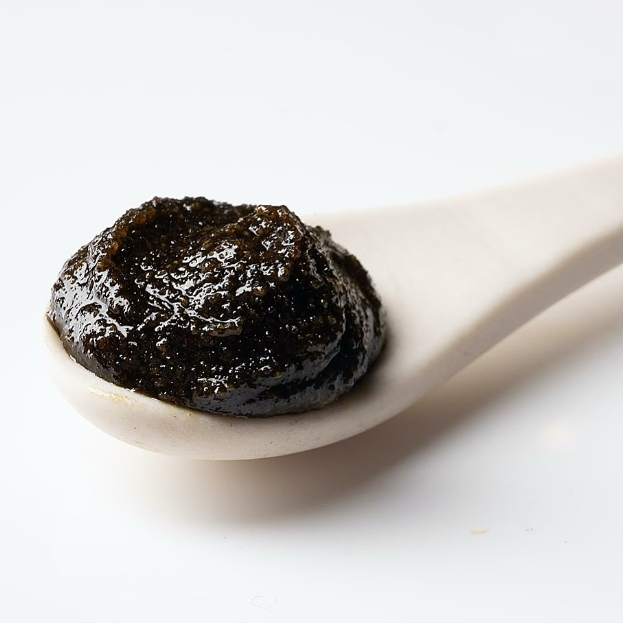 Josh Rosebrook Active Enzyme Exfoliator close up texture on spoon